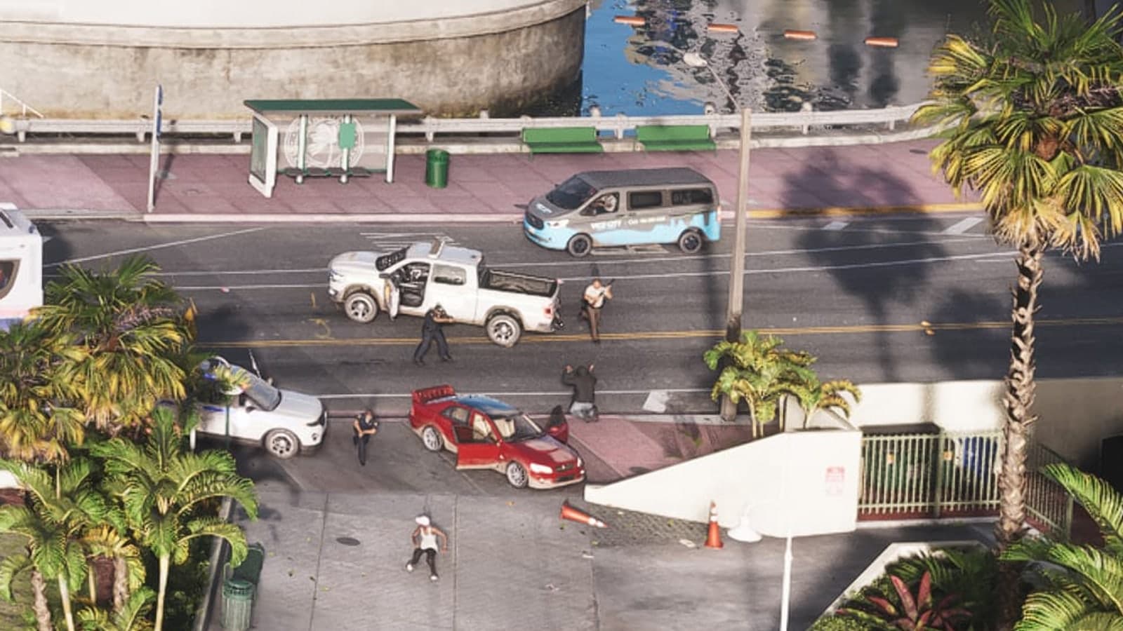 Police officers make an arrest beside a white pickup truck on a Vice City street