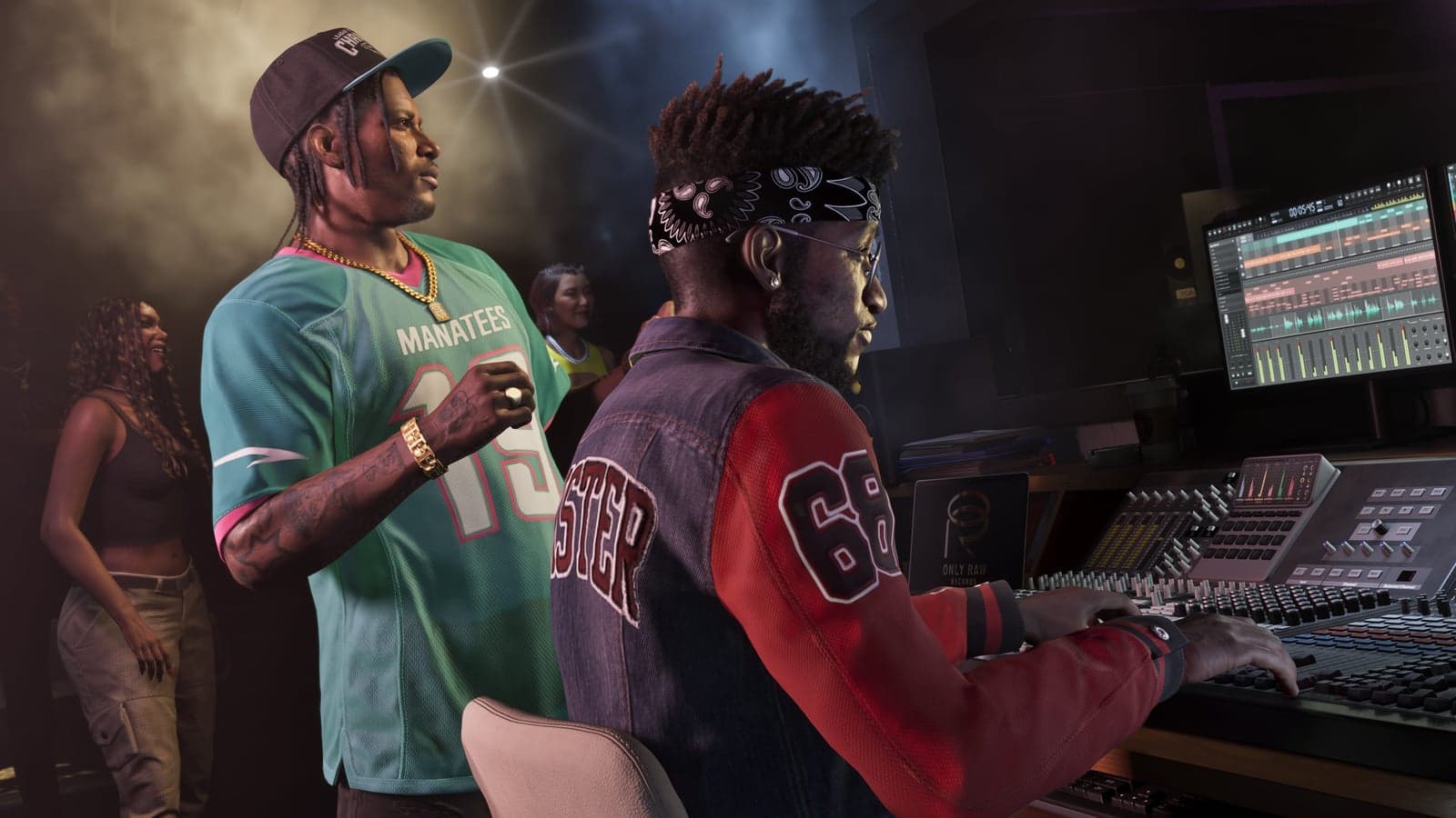 Dre’Quan Priest in a recording studio next to a musician at the mixing desk