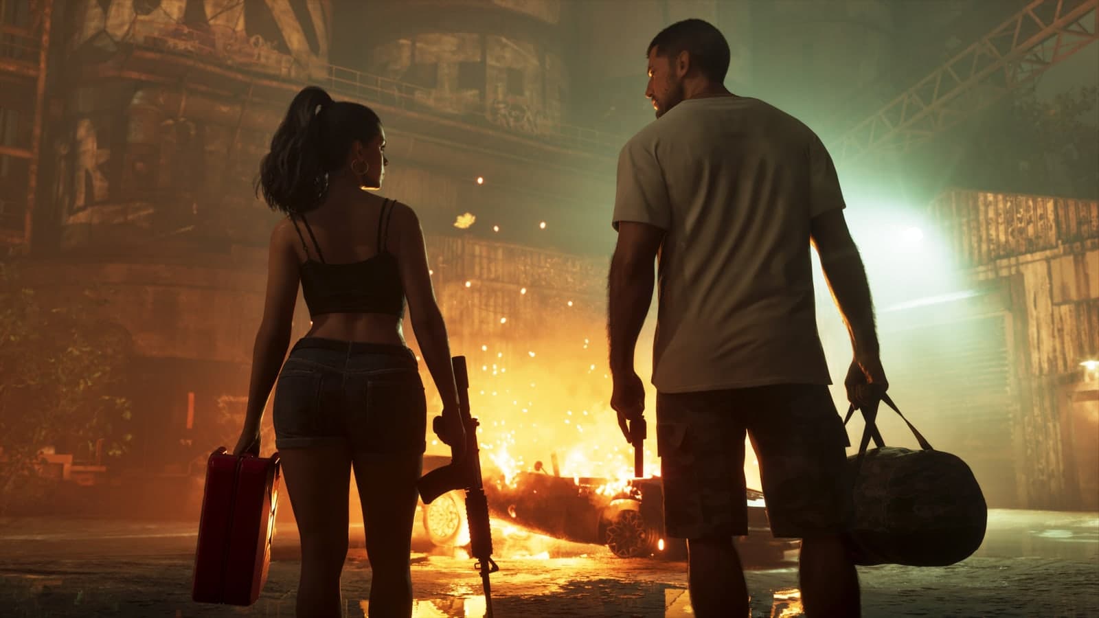 Lucia with a rifle and a fuel can and Jason with a duffel bag walk past a burning car at night