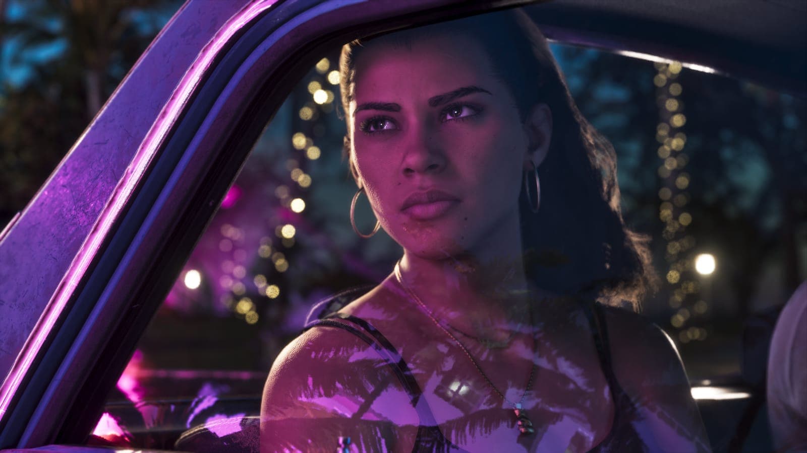 Lucia Caminos driving in neon light, official GTA 6 screenshot