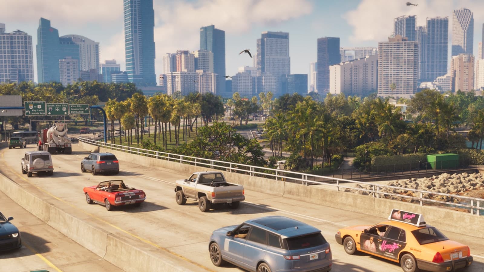 Traffic on a Vice City highway with the downtown skyline and palm trees behind it