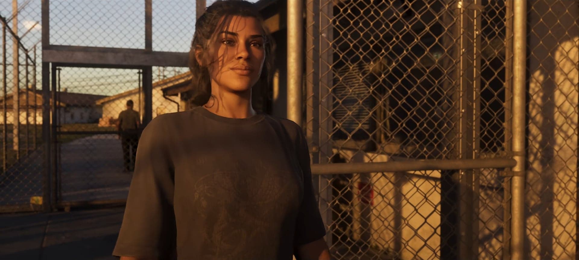 Lucia walking out of the prison gates in the evening light