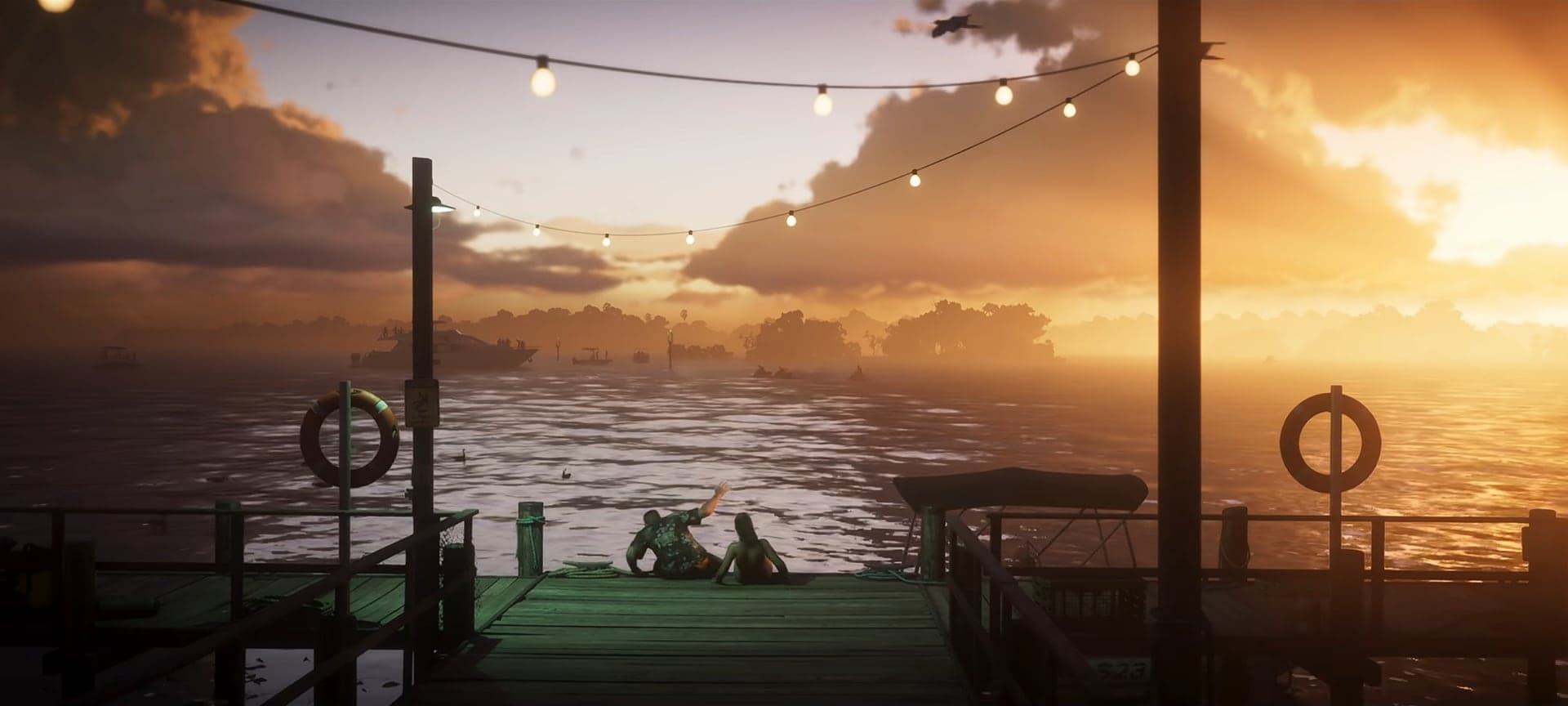 A wooden pier at sunset with string lights, people on the boards
