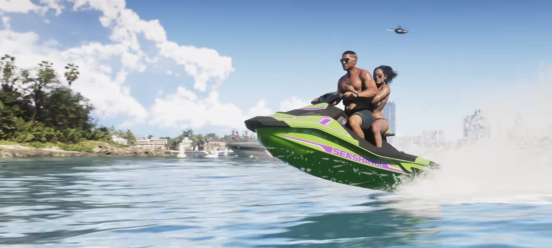 A man and a woman on a green jet ski jumping a wave in a bay