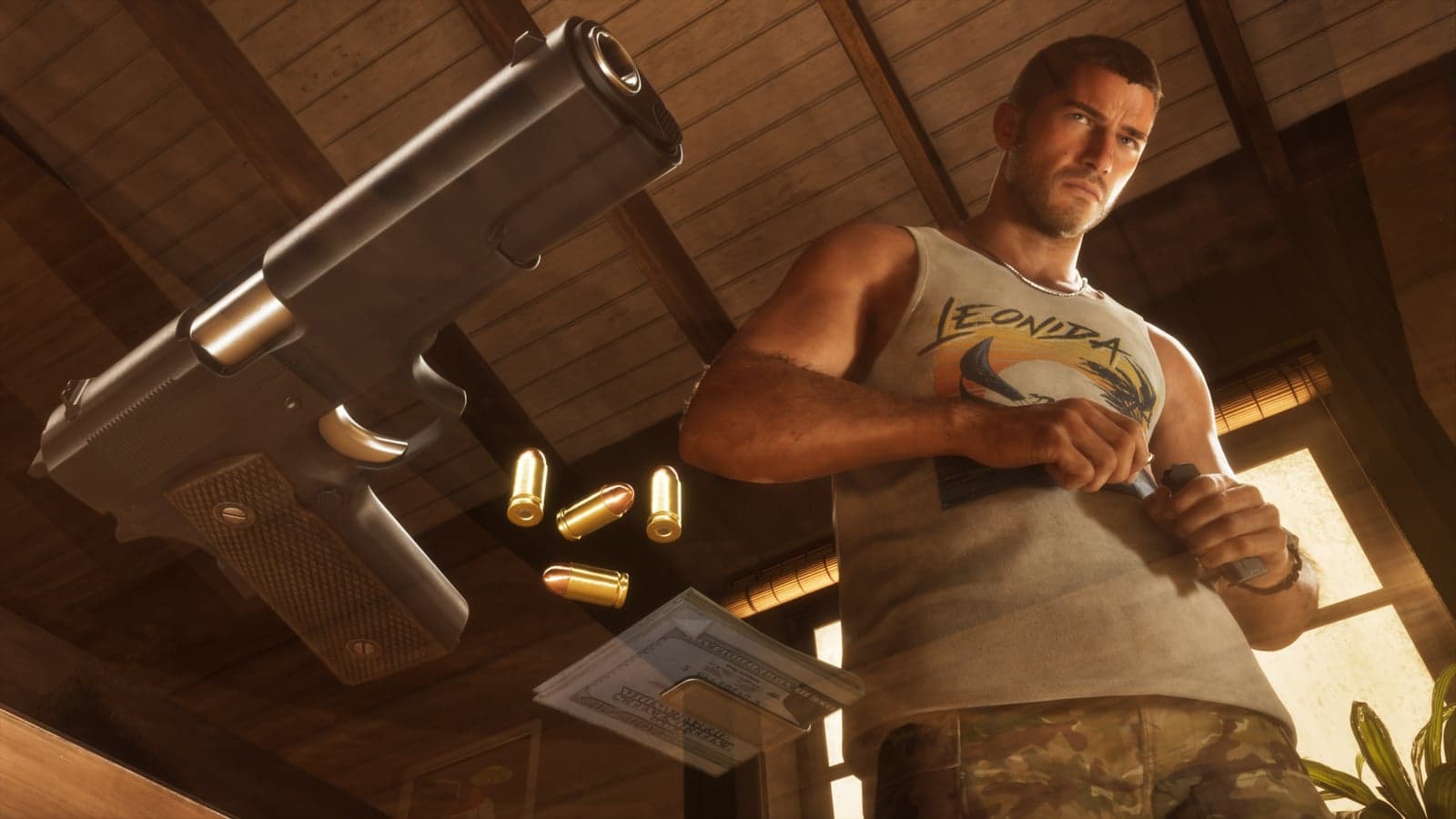 Jason loads a magazine at a table with a pistol and cartridges in the foreground