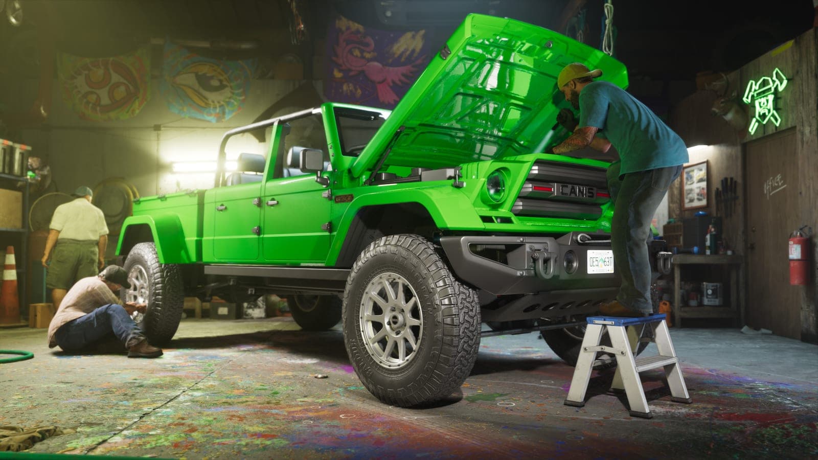 Mechanics at One-Eyed Willie’s work on a bright green off-road truck